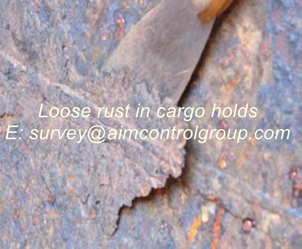 Loose_rust_in_cargo_hold_loss_prevention_for_grain_cargoes
